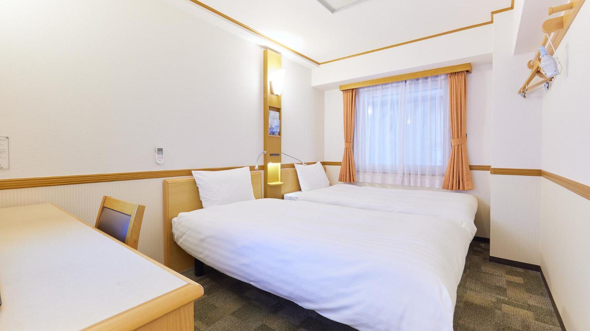 Toyoko Minato Ekimae ホテル 3*